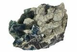 Cubic, Blue-Green Fluorite Crystals on Druzy Quartz - China #128787-1